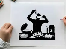 Silhouette of a baker preparing bread in a kitchen