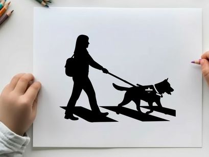 Silhouette of a woman walking her dog on a leash outdoors