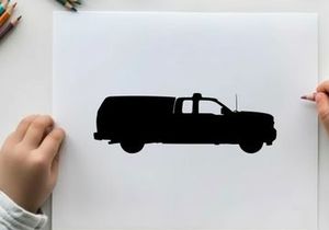 Silhouette of a pickup truck with a covered cargo bed