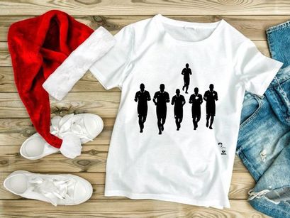 Silhouette of soccer players in motion running with a ball