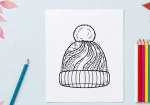 Halaman mewarnai topi rajutan musim dingin dengan pola pom pom dan bunga salju untuk aktivitas Natal