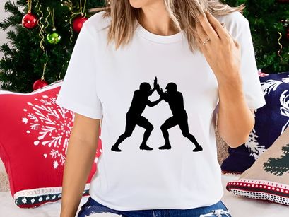 Two martial artists engaged in a fierce combat stance with hands up