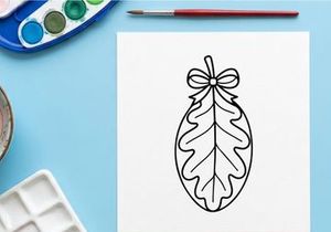 Cozy Christmas gift bag with ribbon and leaf design. Festive holiday packaging for presents and celebrations.
