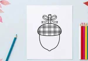 Cute Christmas ornament hanging on a string. Festive holiday decoration with a plaid pattern and bow, ideal for seasonal marketing and greeting cards.