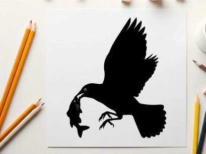 Silhouette of a bird catching a fish in mid air flight