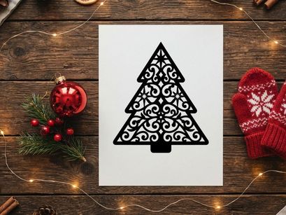 Black ornate Christmas tree silhouette with intricate filigree pattern on white background