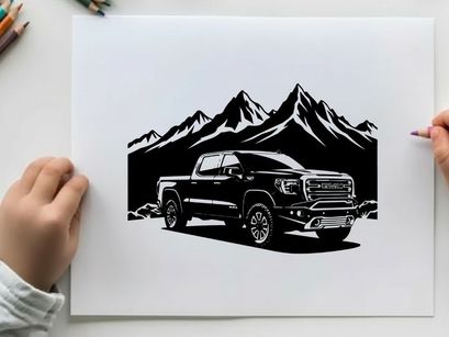 Silhouette of a pickup truck in front of mountains