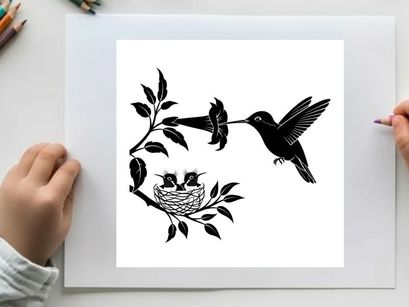 Silhouette of hummingbird feeding young in nest on branch