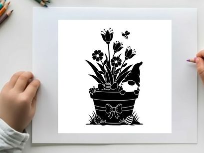 Silhouette of a dog peeking from behind flowers in a decorated pot