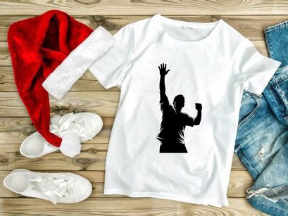 A silhouette of a person with one arm raised in triumph or celebration