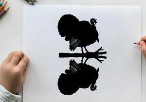 Silhouette of a turkey on a tree branch at night