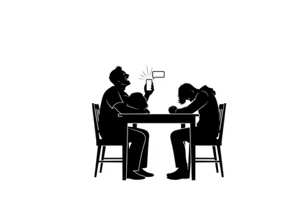 Silhouette of family sitting at a table with a child playing