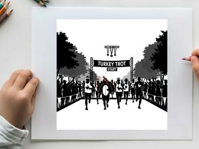 Silhouette of runners at the turkey trot 5k finish line with crowd