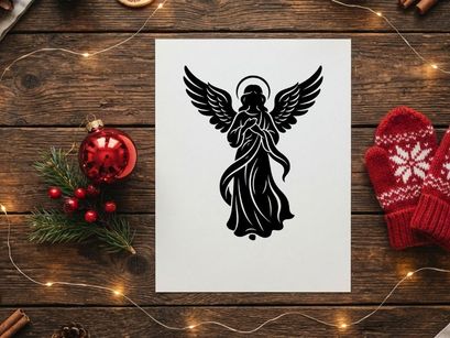 Black silhouette of a Christmas angel with wings and halo on a white background