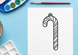 Hand-drawn candy cane ornament with red and white stripes for festive Christmas decor
