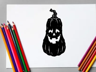Halloween Jack-o'-lantern with spooky face and candlelight glow