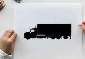 Black silhouette of a large semi truck with trailer
