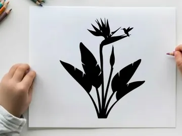 Silhouette of a hummingbird and flower plant preview picture
