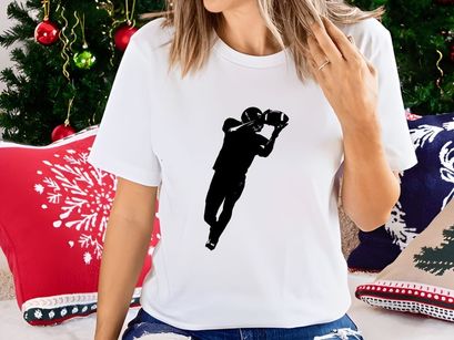 A silhouette of a person jumping and lifting dumbbells upwards in a dynamic motion