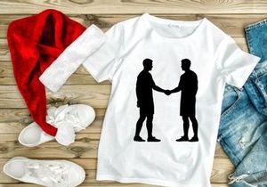 Two men shaking hands in a symbolic gesture of agreement or partnership