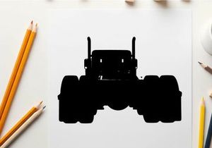 Silhouette of a large truck with oversized tires and exhaust pipes