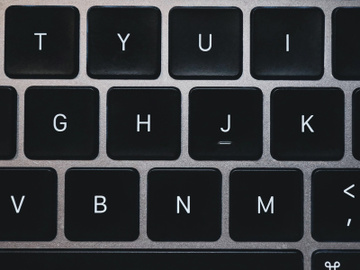 Laptop keyboard alphabets keys closeup concept image preview picture