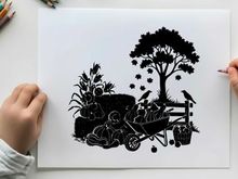 Silhouette of wheelbarrow and tree with birds