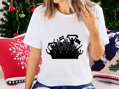 Silhouette of a cheering crowd with flags and banners at a sports event or festival