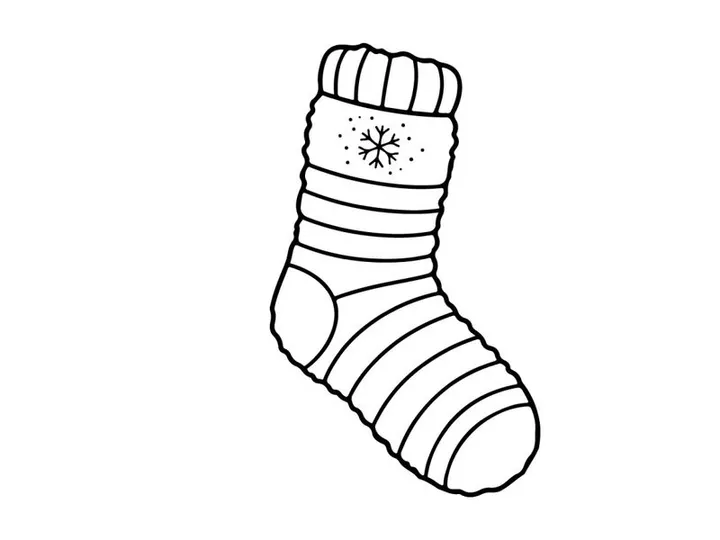 Cozy Christmas sock with snowflake pattern isolated on white background for festive holiday decor