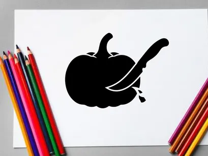 Schwarze Silhouette eines Vogels auf einer Paprika