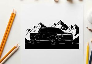 Silhouette of a pickup truck in front of majestic mountain range silhouette