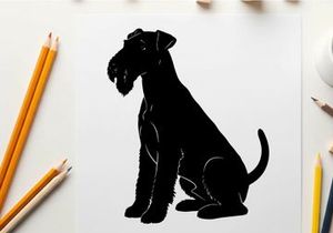 Silhouette of a sitting dog with floppy ears and tail