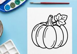 Pumpkin with leaf for autumn harvest. Seasonal vegetable display for fall decor.