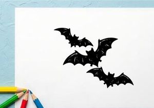 Group of Flying Bats in Dark Night Sky for Halloween or Horror Themes