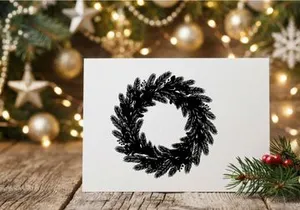 Black Christmas wreath silhouette, festive pine branch circle isolated on white background