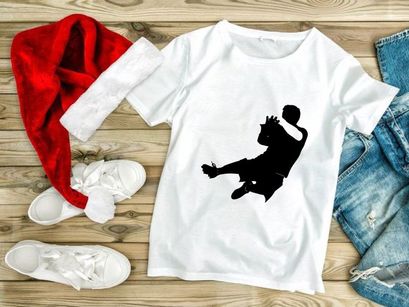 A black silhouette of a person jumping in mid air with arms raised