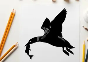 Silhouette of a bird in flight with prey