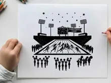 American football stadium silhouette with cheerleaders and players