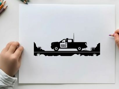 Silhouette of a pickup truck driving on a road with trees