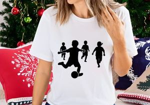 Children playing soccer silhouette