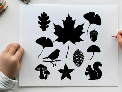 Silhouette of various forest elements and animals in black