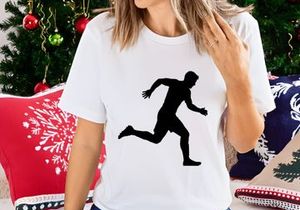 A silhouette of a man running quickly with athletic posture and movement