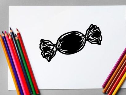 Close-up of a wrapped candy on a white background