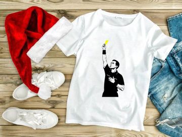 A man in a black shirt throwing a yellow object upwards with his right hand preview picture