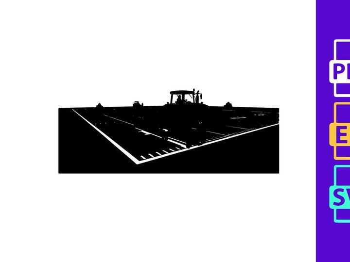 Tractor in a field with rows of crops or soil preparation