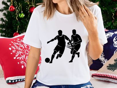 Two soccer players competing for the ball in a intense match moment