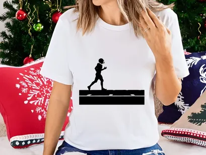 Silhouette of a football player running with the ball on a field