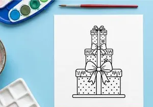 Stacked Christmas gift boxes with bows and snowflake pattern for festive holiday decor.