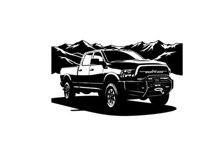 Silhouette of a pickup truck in front of mountains