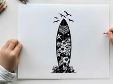 Surfboard silhouette with floral design and flying birds